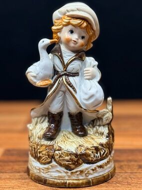 Boy Holding Goose Music Box